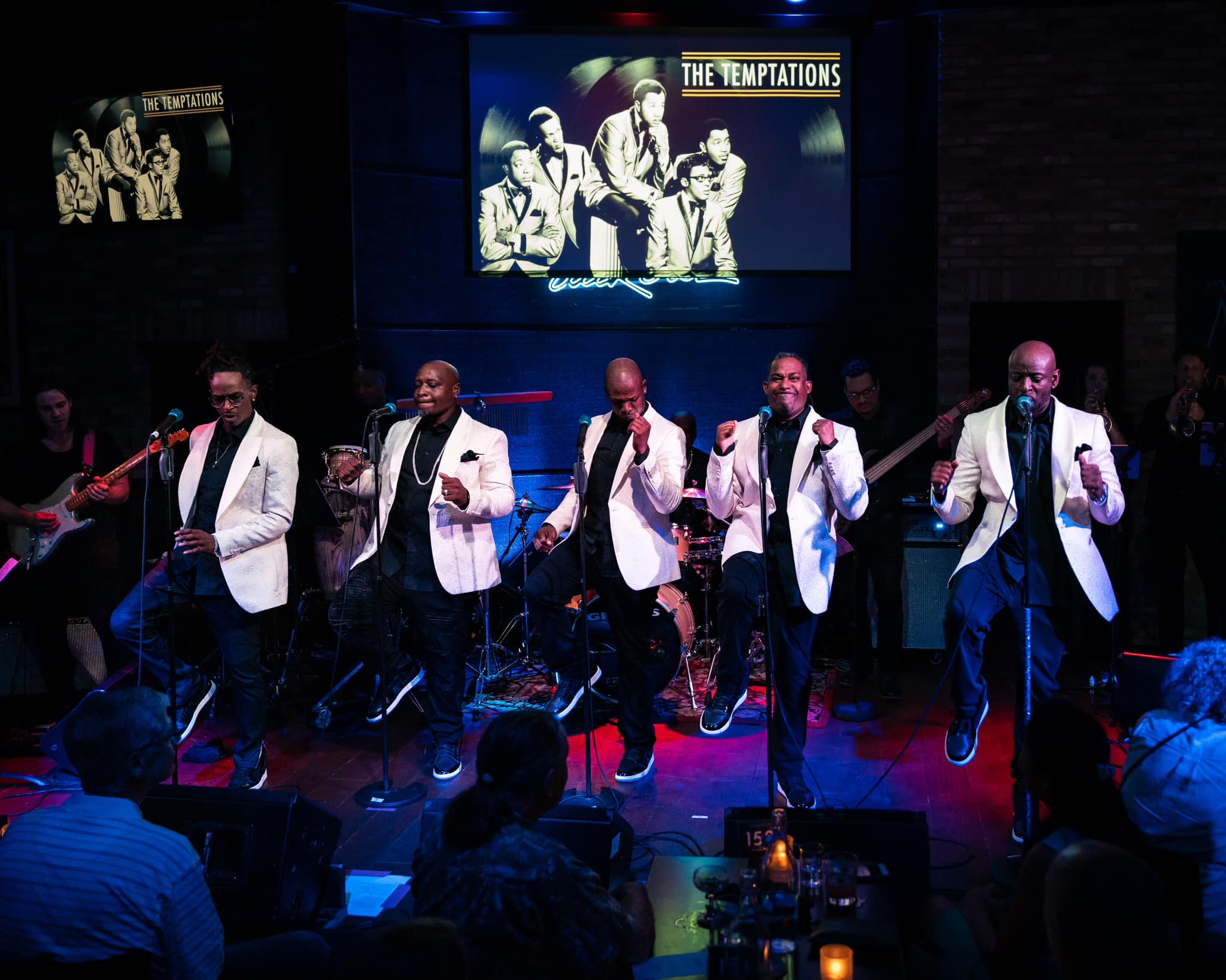 Men of Motown dancing with white jackets